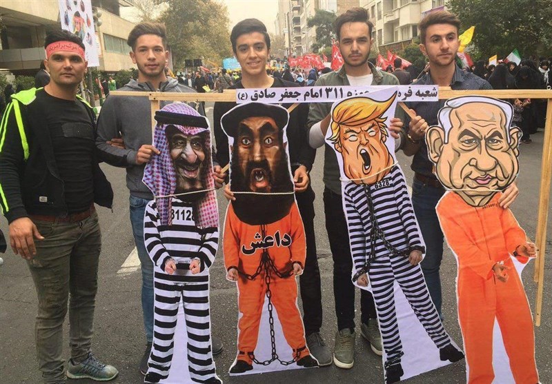 دانش آموزان تهرانی تروریست‌های جهان را به زنجیر کشیدند + تصاویر