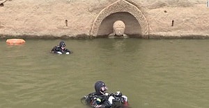 کشف یک مجسمه ۶۰۰ ساله بودا از زیر آب در چین+ تصاویر